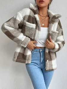 Elegant brown and white plaid plush jacket paired with light blue denim jeans
