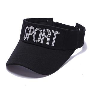Detail of SPORT embroidery and breathable fabric on a black sun visor for sports