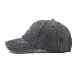 Vintage washed charcoal cotton baseball cap with retro white embroidery in 45-degree view