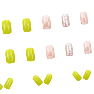 Short mustard green checkerboard press-on nails with silver glitter and pink accents