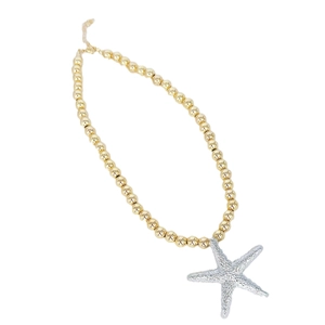Beaded gold necklace featuring a silver starfish pendant with realistic shell textures