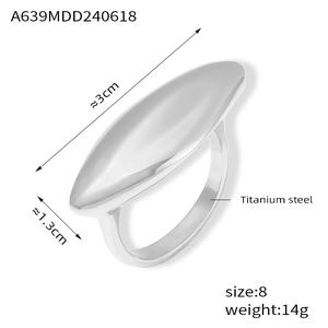 Macro shot of silver titanium steel ring showing size 8 and 14g weight specifications