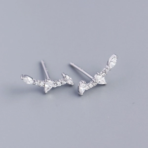 Macro detail of S925 sterling silver bar earrings with marquise and round cubic zirconia