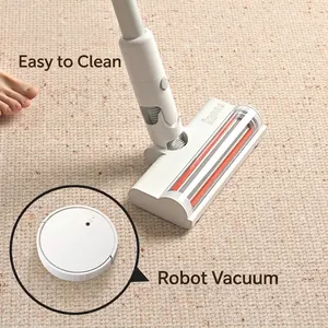 White vacuum cleaner brush head with red roller brush on beige carpet for home cleaning