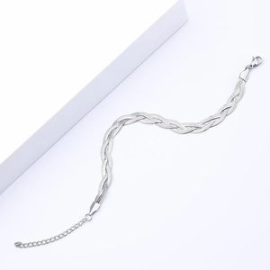 Detailed view of the lobster clasp and adjustable extension chain on braided steel bracelet