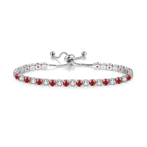 Detail of tennis bracelet with red and white zircon stones and adjustable bolo clasp