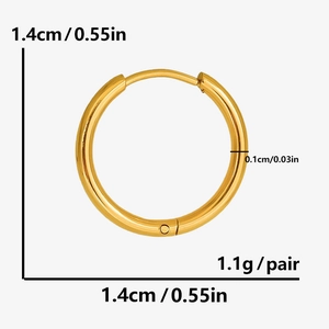 Macro detail of golden hoop earring showing 1.4cm diameter and 0.1cm thickness specs