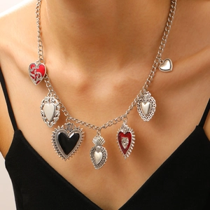 Gothic retro silver necklace featuring multiple red sacred heart pendants for women