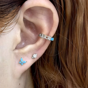 925 silver butterfly and clover stud earrings set with light blue crystals and chain cuff