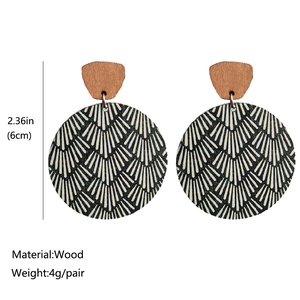 Bohemian round wood earrings with black and white shell pattern, 6cm long and lightweight