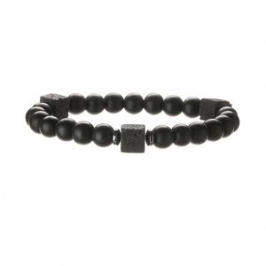 Close-up of men's matte black beaded bracelet with porous volcanic lava stone accents