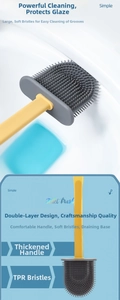 Detail of toilet brush with yellow handle and grey TPR bristles for deep corner cleaning