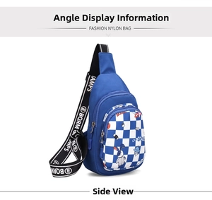 Detail view of children's blue nylon chest bag with astronaut pattern and checkerboard pocket
