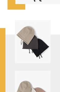 Close-up of ribbed knit beanie with adjustable drawstring and rolled edge detail