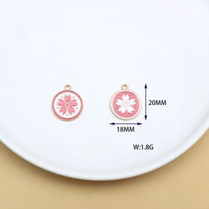 Pink and white cherry blossom enamel charms with gold frames for DIY jewelry making