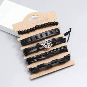 Detailed set of 5 handmade leather bracelets featuring tree of life charm and beads