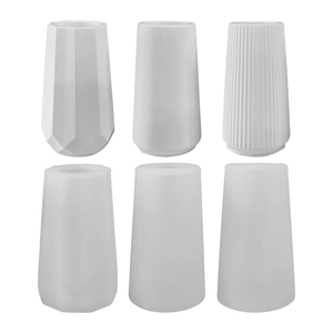 Set of six white geometric resin vases with sleek matte texture for DIY floral arrangements