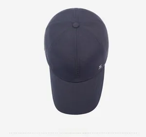 Top view of dark blue quick-dry baseball cap featuring a white S embroidered logo