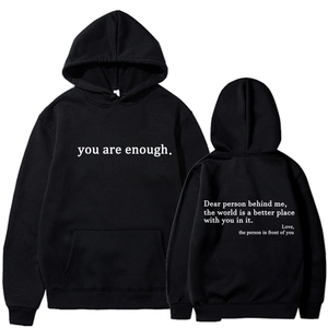 Detail of white inspirational letter print on black fleece hoodie with pocket