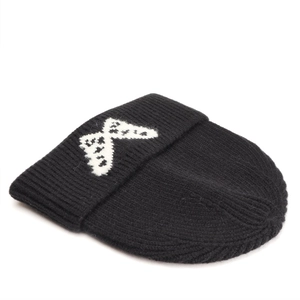 Close-up of butterfly jacquard pattern and thick knit texture on the black beanie hat