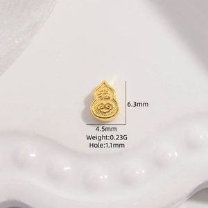 Macro view of gold S925 silver gourd bead with Fu character and 6.3mm dimensions