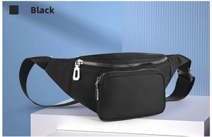 Detail of waterproof black nylon fanny pack with silver zippers on a display stand