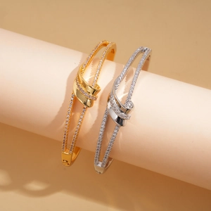 Double-layer 18k gold plated bangle with cross knot and sparkling zircon stones for women