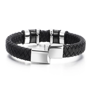 Men's vintage braided leather bracelet with silver X-shaped accents and magnetic clasp