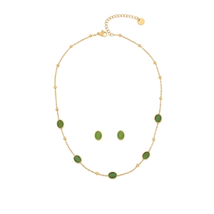 Emerald green stone jewelry set featuring scallop necklace and stud earrings in gold finish