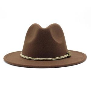 Detail of brown wool fedora hat with ethnic style beaded decorative rope band