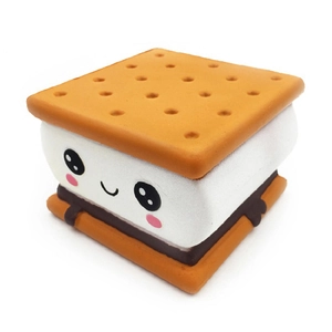Slow rebound squishy sandwich biscuit toy with cartoon smiley face on white background