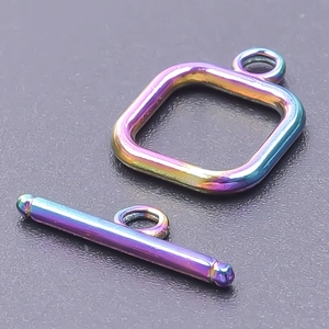 Macro view of rainbow plated stainless steel square OT toggle clasp for jewelry making