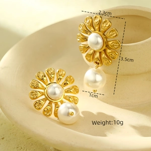 Detailed view of gold flower pearl earrings with dimensions 3.5cm by 2.3cm and 10g weight