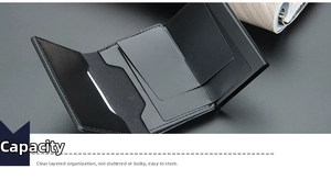 Detail view of the black multi-slot card holder interior with tiered leather card slots