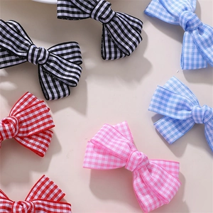 Fashionable checkerboard bow hair clips in various colors for women's ponytails