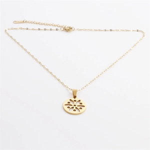 Titanium steel necklace with gold disk pendant featuring hollow floral design on white background