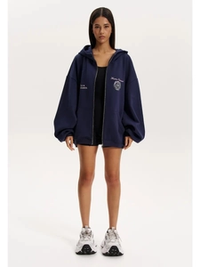 Navy blue oversized zip-up hoodie with Freedom Unlimited print and kangaroo pocket