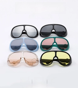 Matrix view of oversized wrap-around sunglasses in six color variations on white background