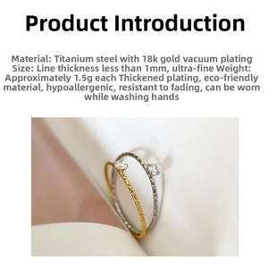 Macro shot showing 1mm titanium steel ring bands with 18k gold plating and small cubic zirconia