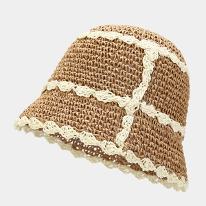 Two-tone crochet straw bucket hat with wavy beige trim and breathable woven pattern