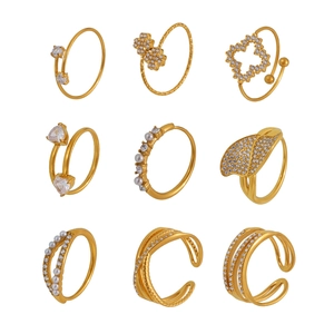 Set of 9 gold-plated fashion rings featuring geometric hearts, flowers and 5A zircon stones