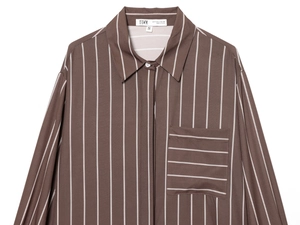 Detail of vertical brown stripes and chest pocket on a long-sleeved collared shirt