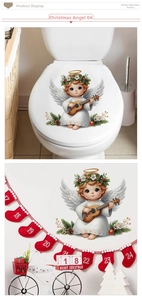 Detailed view of cartoon angel wall stickers on a toilet lid with Christmas decor
