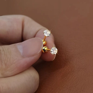 Gold round zircon stud earrings with classic 4-prong setting and screw-back ball closure