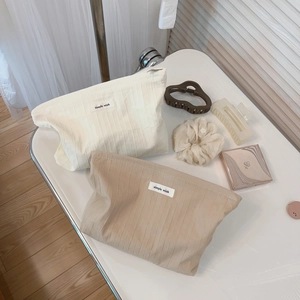 Minimalist cotton striped makeup bag set with simple wish labels in beige and khaki colors