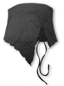 Detail of black strapless crop top featuring irregular hem and side drawstring ruching
