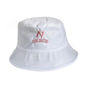 Detail of pink embroidered N GRACE text on a white cotton bucket hat surface
