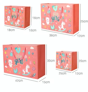 Size specifications for pink paper gift bags featuring teddy bear and rocking horse motifs