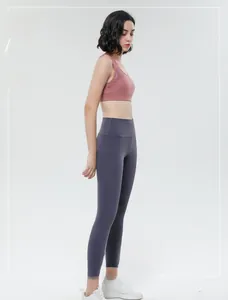 Close-up of high-waist peach lift yoga leggings and breathable racerback sports bra