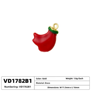 Detail view of red and green enamel horn pendant with brass base and dimensions